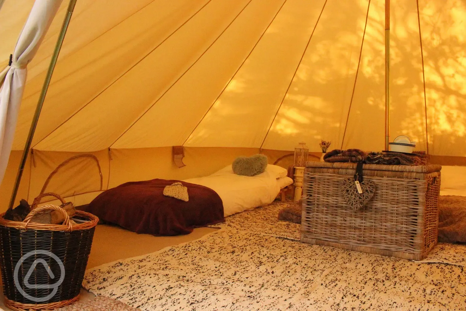 Bell tent furnished interior at Stackpole Under the Stars