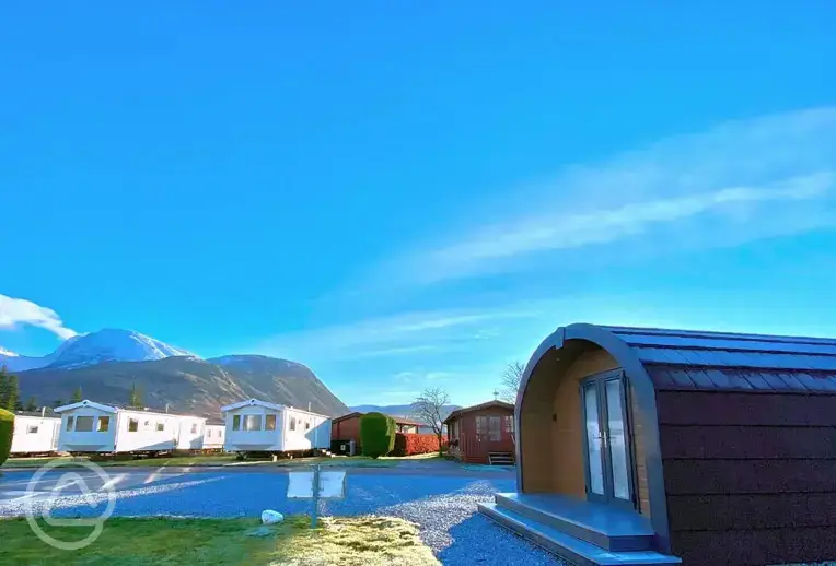 Glamping pods and static caravans exterior with mountain views