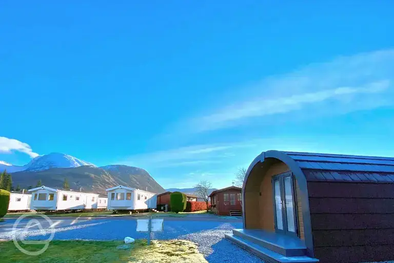 Glamping pods and static caravans exterior with mountain views