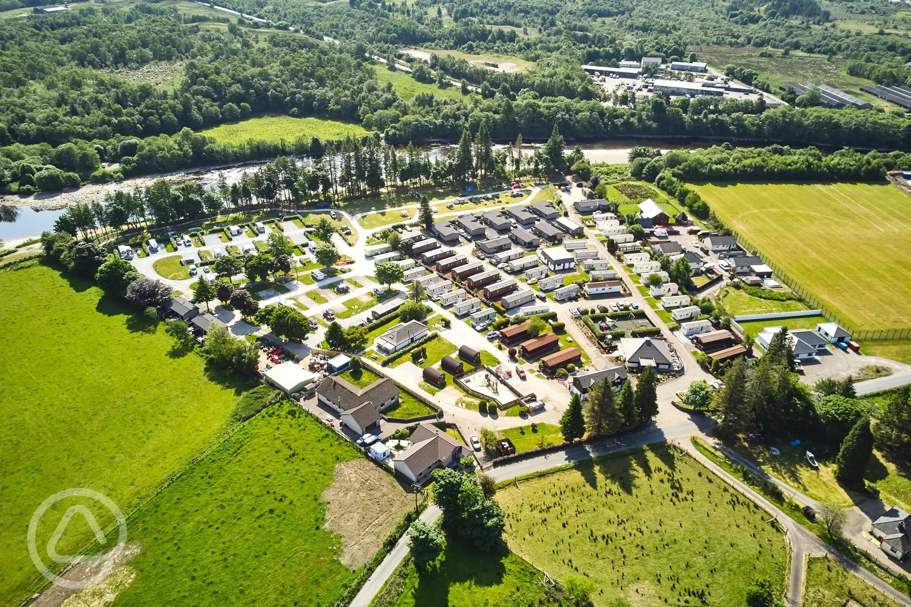 Aerial of Ben Nevis Holiday Park with the River Lochy flowing alongside