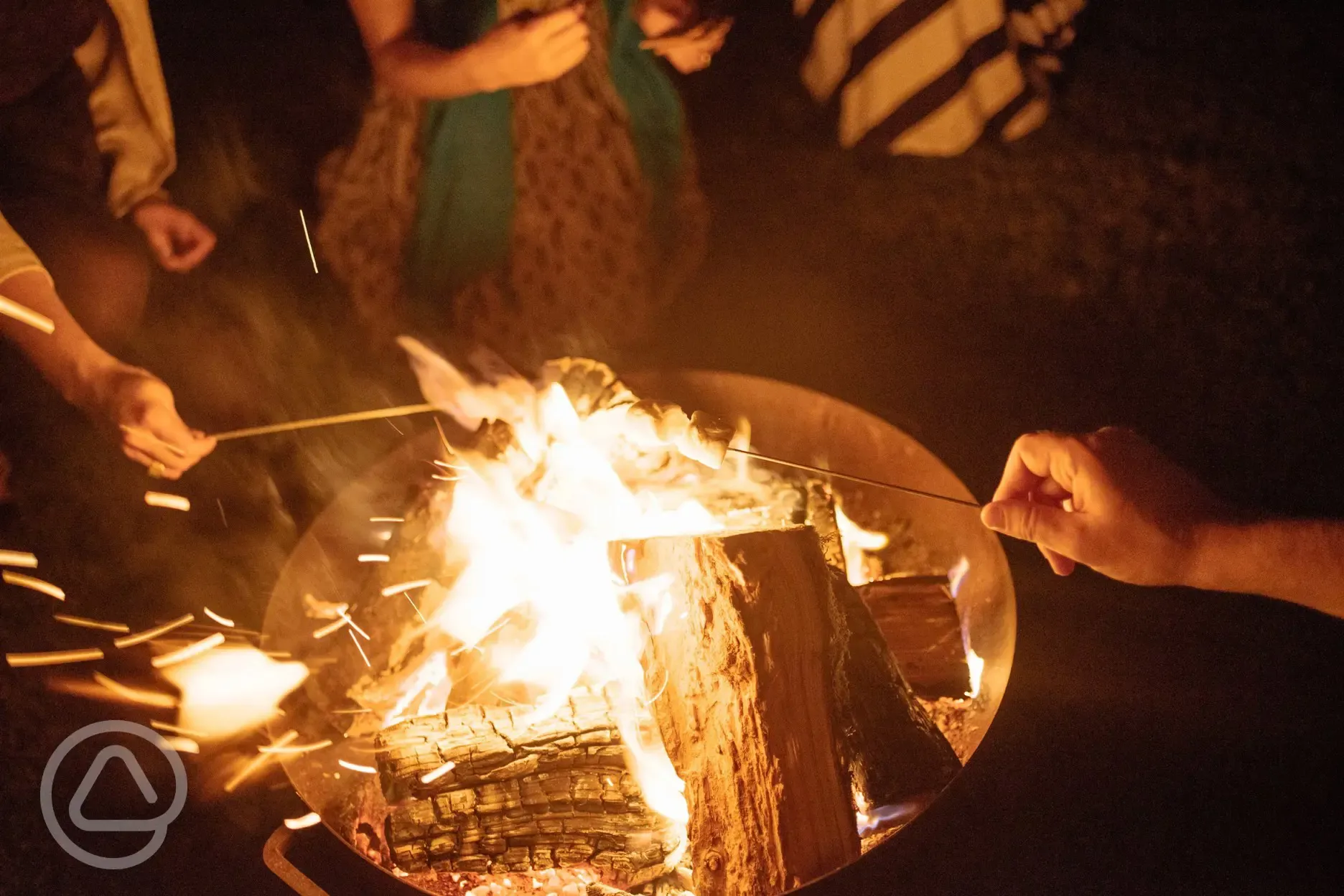 Outdoor fire pit for every pitch, wood supplied each day.