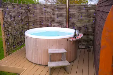 Private wood-fired hot tubs at Wingbury Farm Glamping