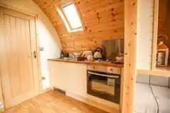 Ensuite glamping pod fully fitted kitchen with an oven, fridge and freezer