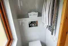 Ensuite toilet with a heated towel rail