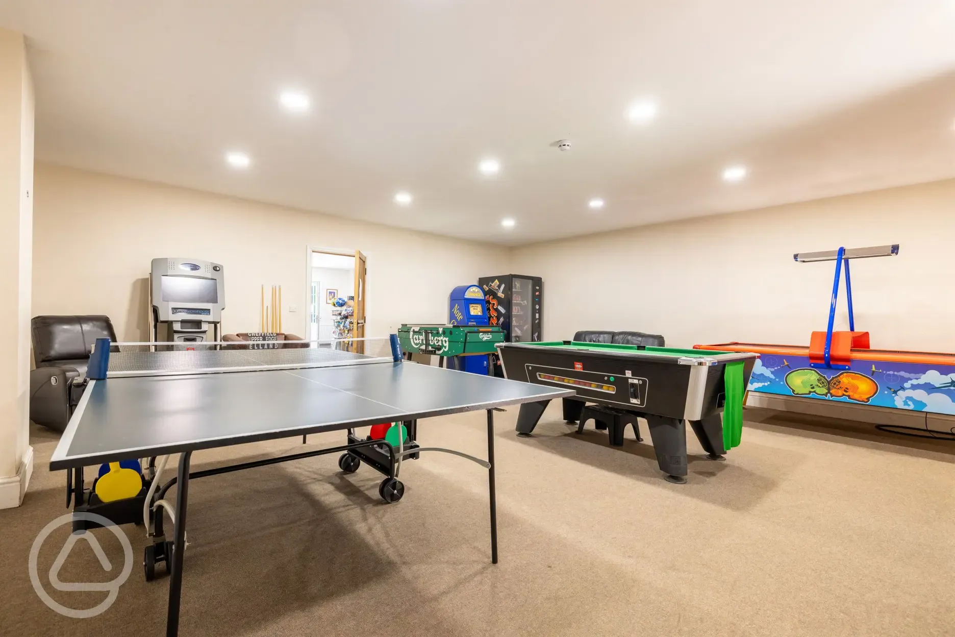 Games room with ping pong, pool, and air hockey at Nurseries Caravan Park Games room with ping pong, pool, and air hockey at Nurseries Caravan Park