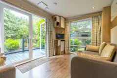 Studio pod cabin living area with a TV and DVD player Studio pod cabin living area with a TV and DVD player