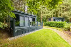 Studio pod ensuite cabin with private decking and outdoor seating Studio pod ensuite cabin with private decking and outdoor seating