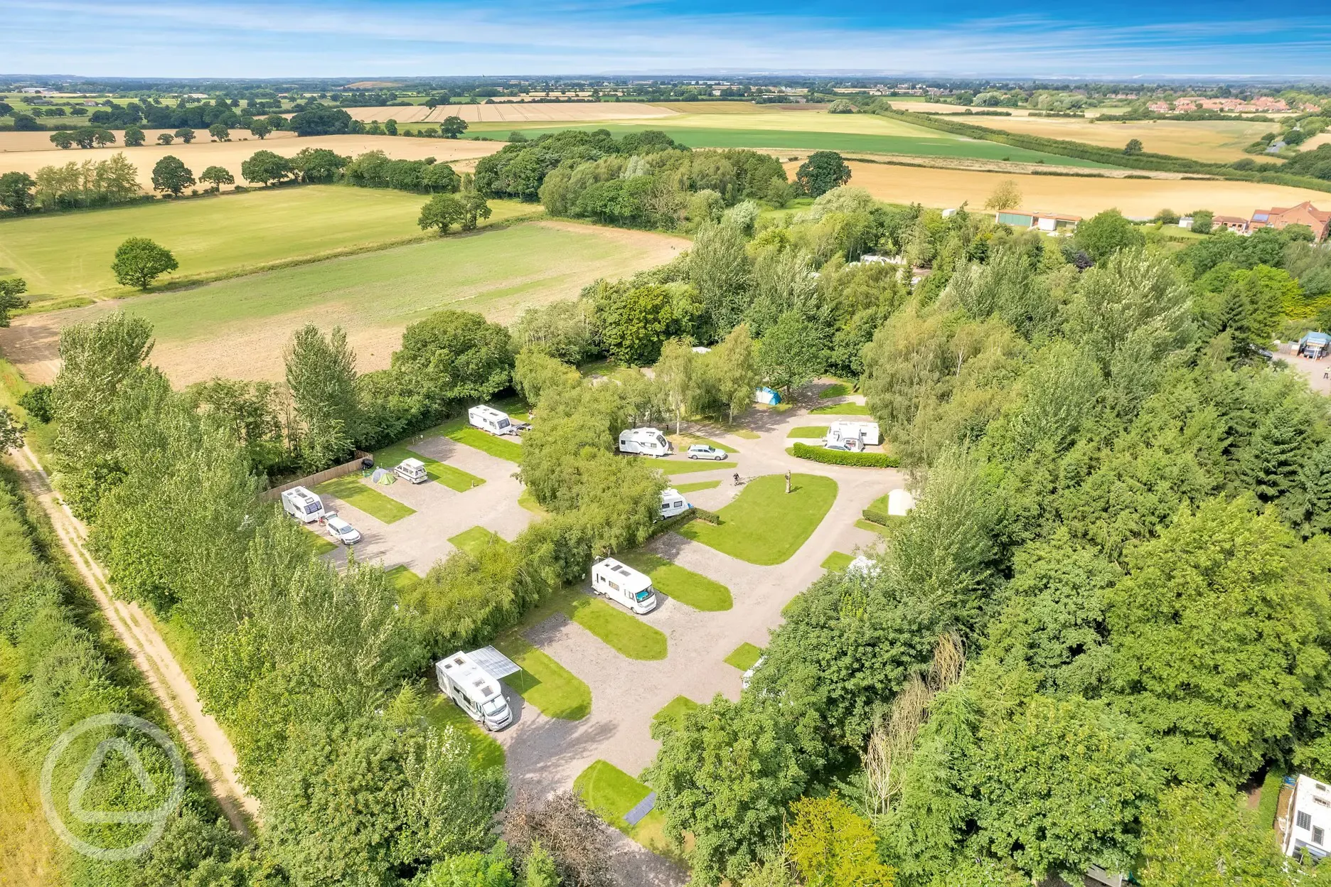 Aerial view of Nurseries Caravan Park and rural scenery Aerial view of Nurseries Caravan Park and rural scenery