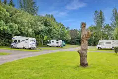 Motorhomes on electric hardstanding pitches (8m) with 16 amp hook up Motorhomes on electric hardstanding pitches (8m) with 16 amp hook up