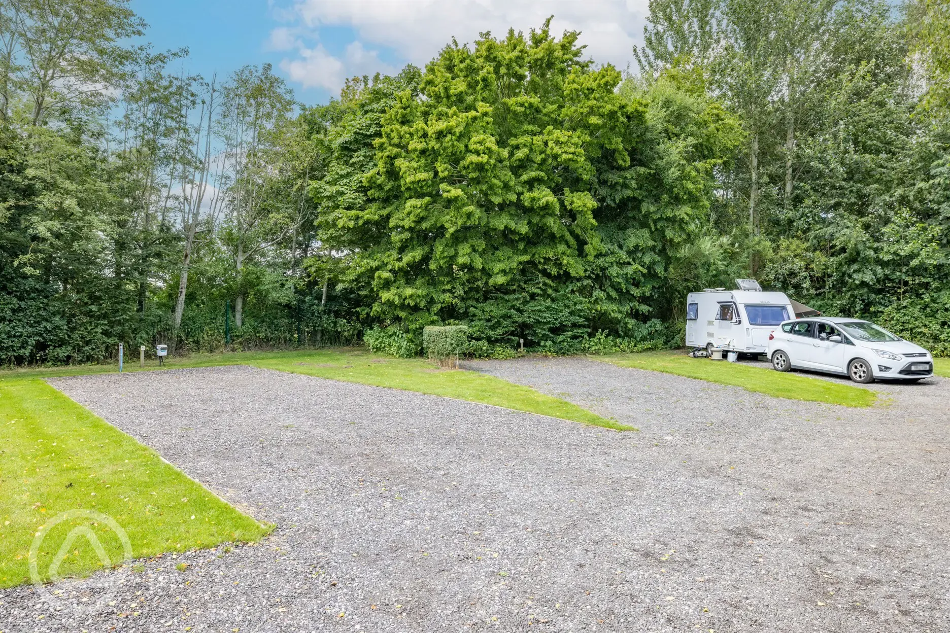 Caravan on electric hardstanding pitches (8m) with 16 amp hook up Caravan on electric hardstanding pitches (8m) with 16 amp hook up