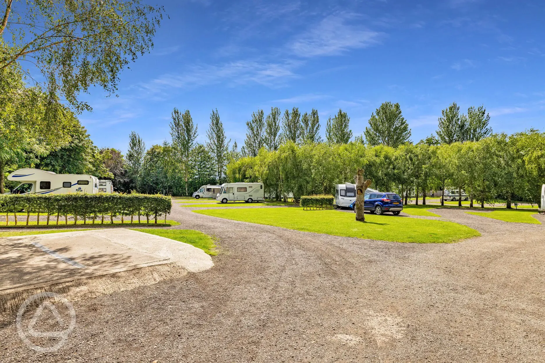 Electric hardstanding pitches (8m) with 16 amp hook up Electric hardstanding pitches (8m) with 16 amp hook up