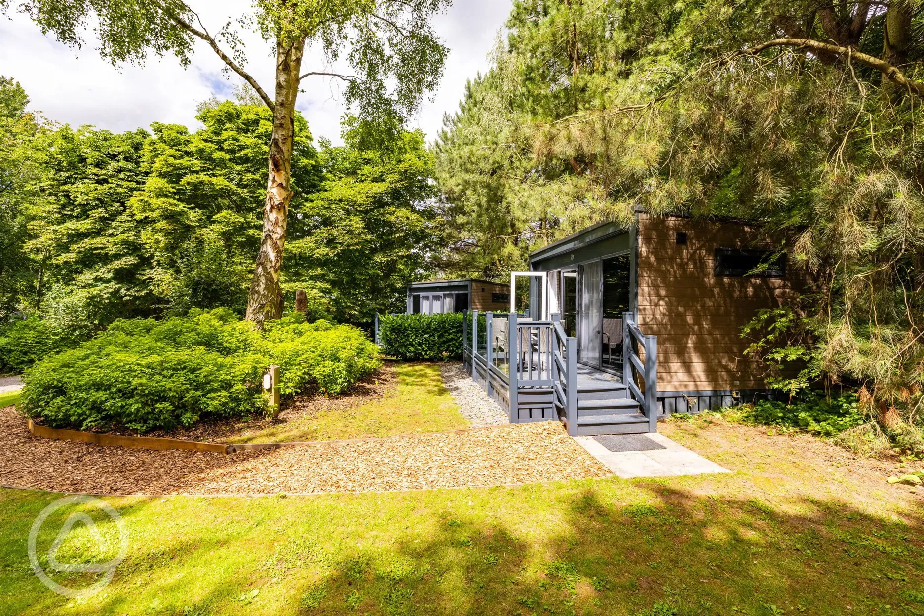 Studio pod ensuite cabin with private decking and outdoor seating Studio pod ensuite cabin with private decking and outdoor seating