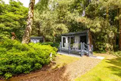 Studio pod ensuite cabin with private decking and outdoor seating Studio pod ensuite cabin with private decking and outdoor seating
