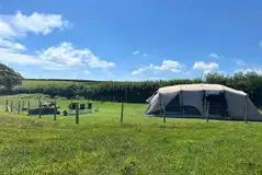 Superior private pitch with a sheltered hedge Superior private pitch with a sheltered hedge