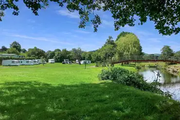 Electric grass pitches by the river