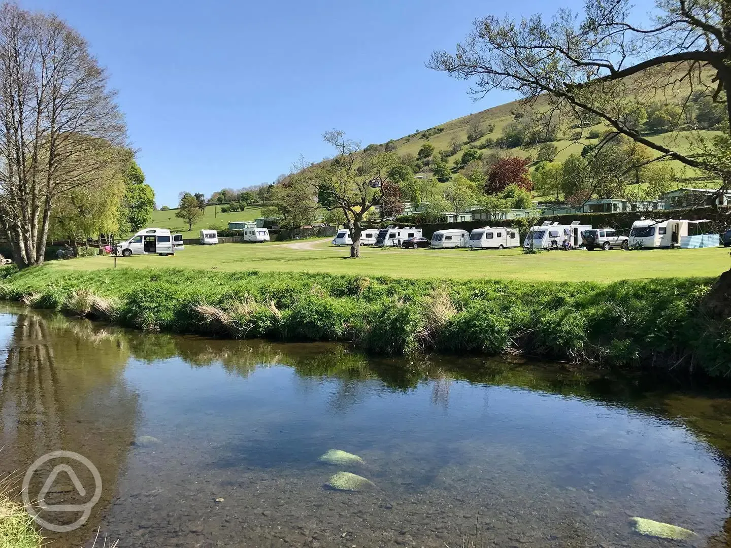 Electric grass pitches by the river