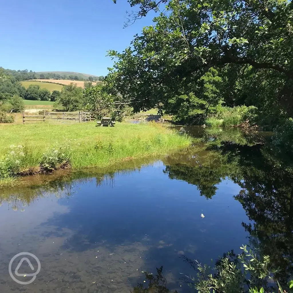 River Tanat running through the site