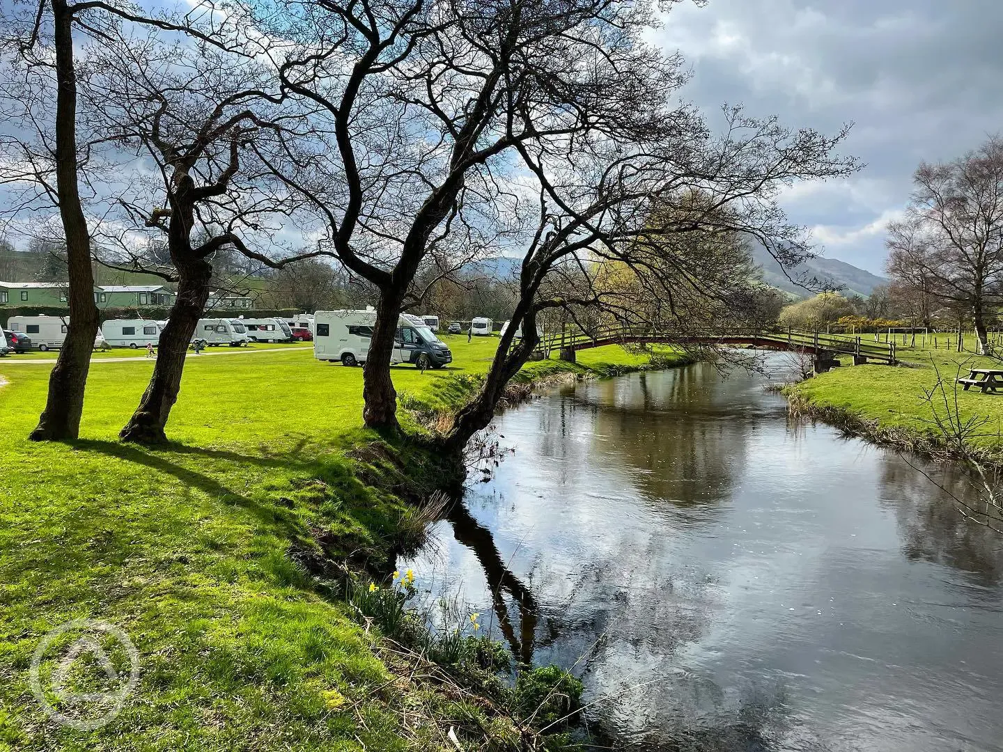 Electric grass pitches by the river