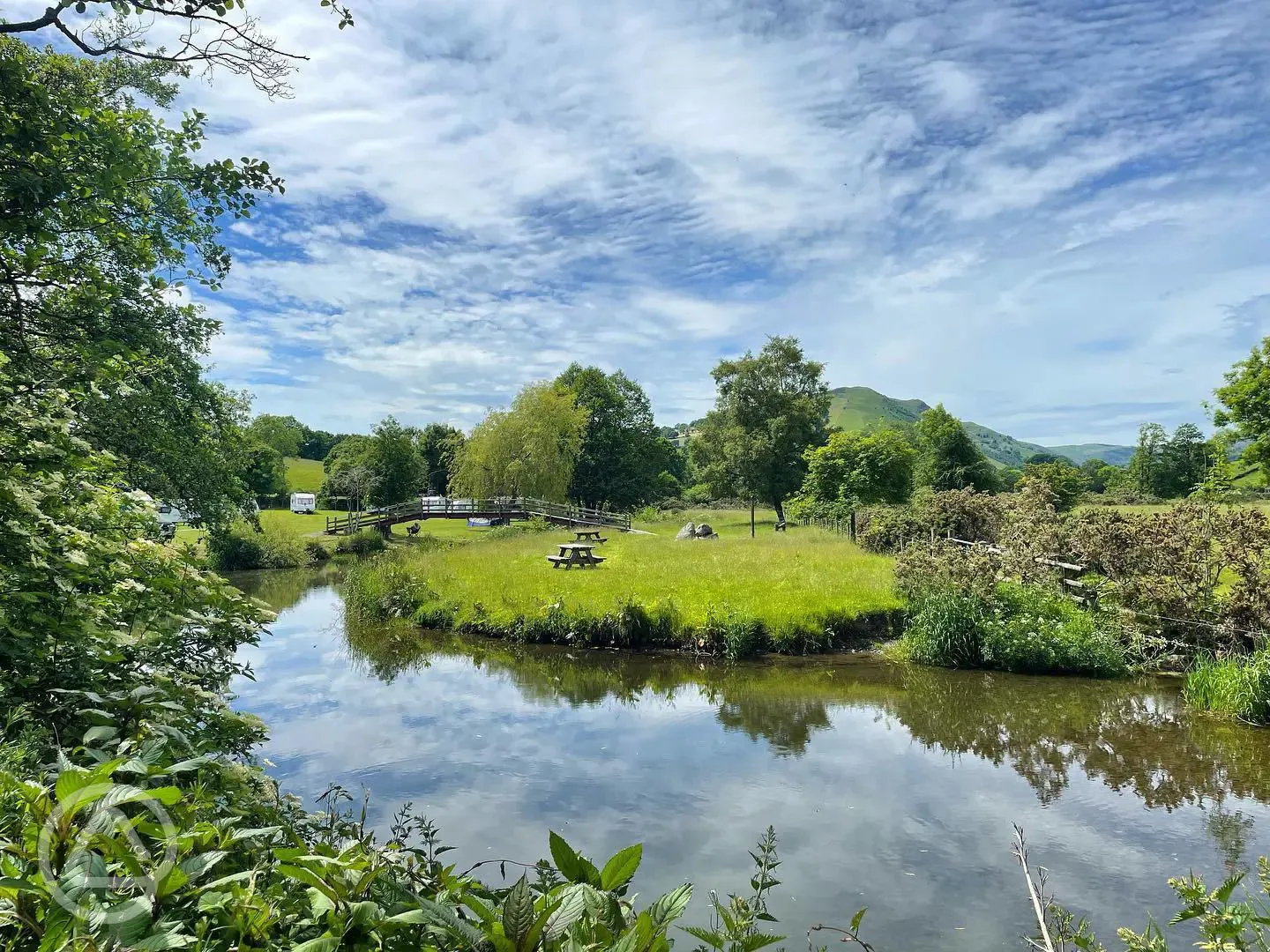 River Tanat running through the site