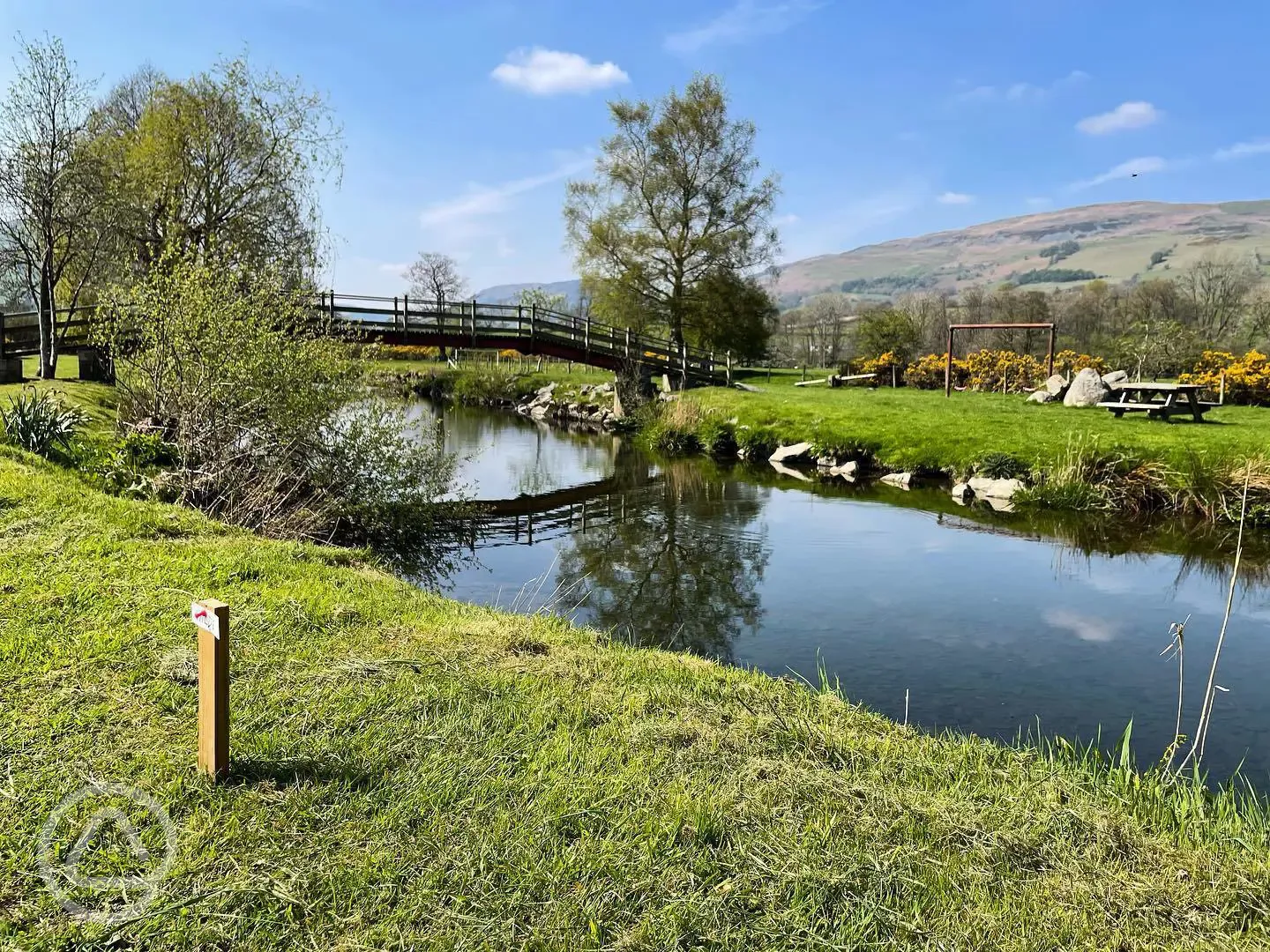 River Tanat running through the site and football goal posts