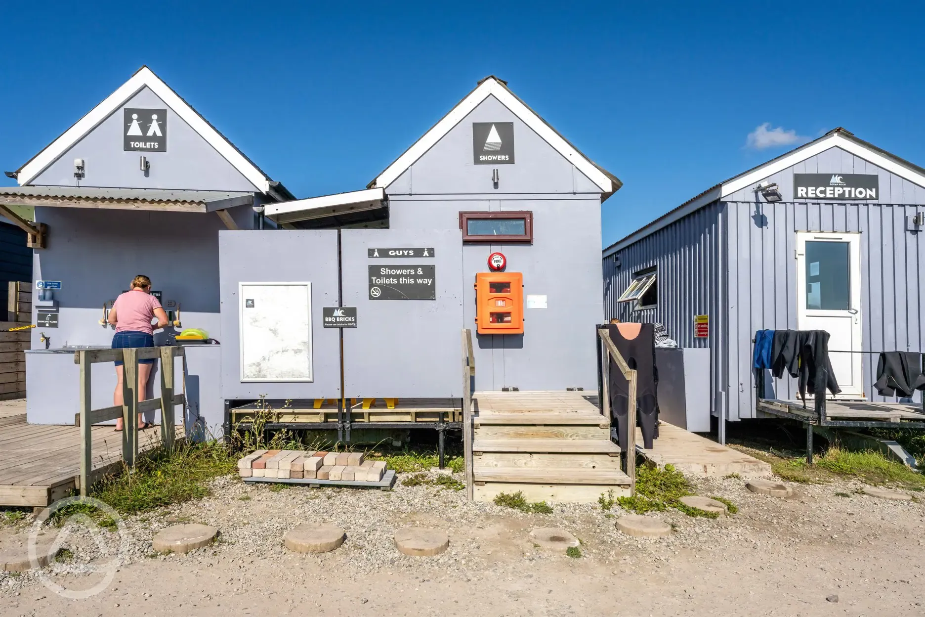Shower and toilet blocks beside reception at Ocean Pitch Campsite