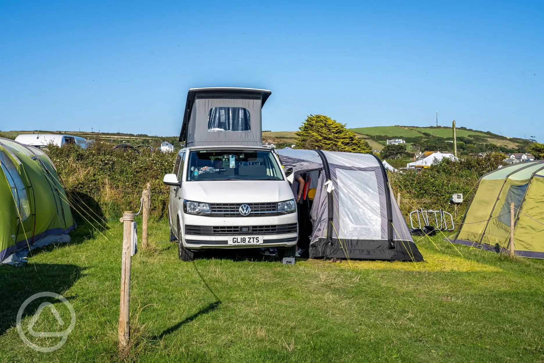Electric medium grass pitch with awning space