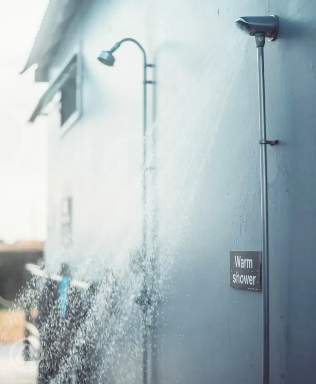 Outdoor warm shower at Ocean Pitch Campsite