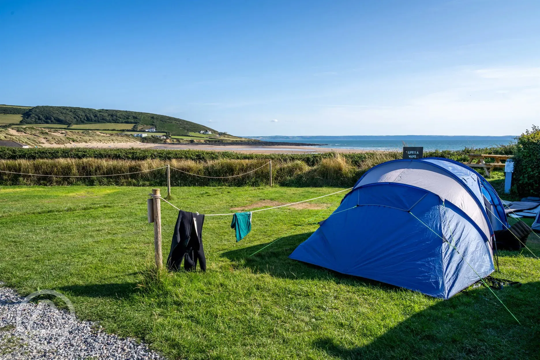 Tent on sea view grass pitch at Ocean Pitch Campsite
