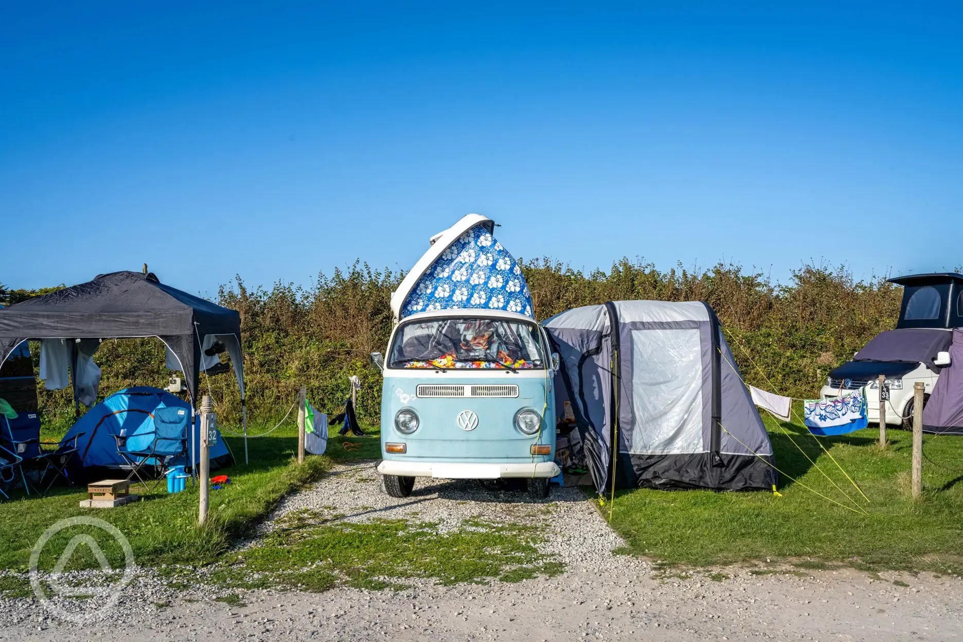 Electric hardstanding pitch with gazebo and awning space