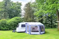 Fully serviced grass pitches with 16 amp hook up with awning space Fully serviced grass pitches with 16 amp hook up with awning space