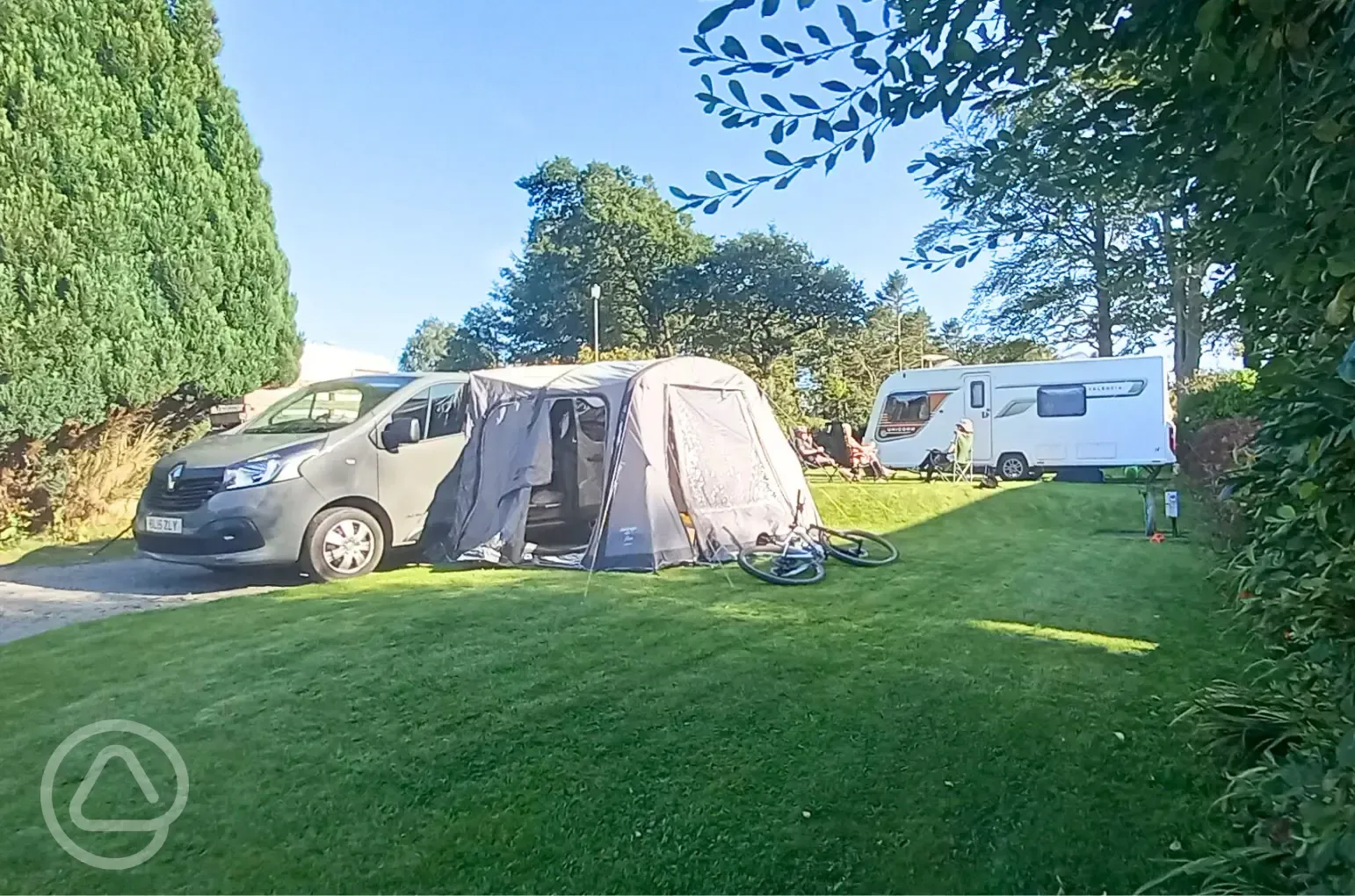 Fully serviced grass pitches with 16 amp hook up with awning space