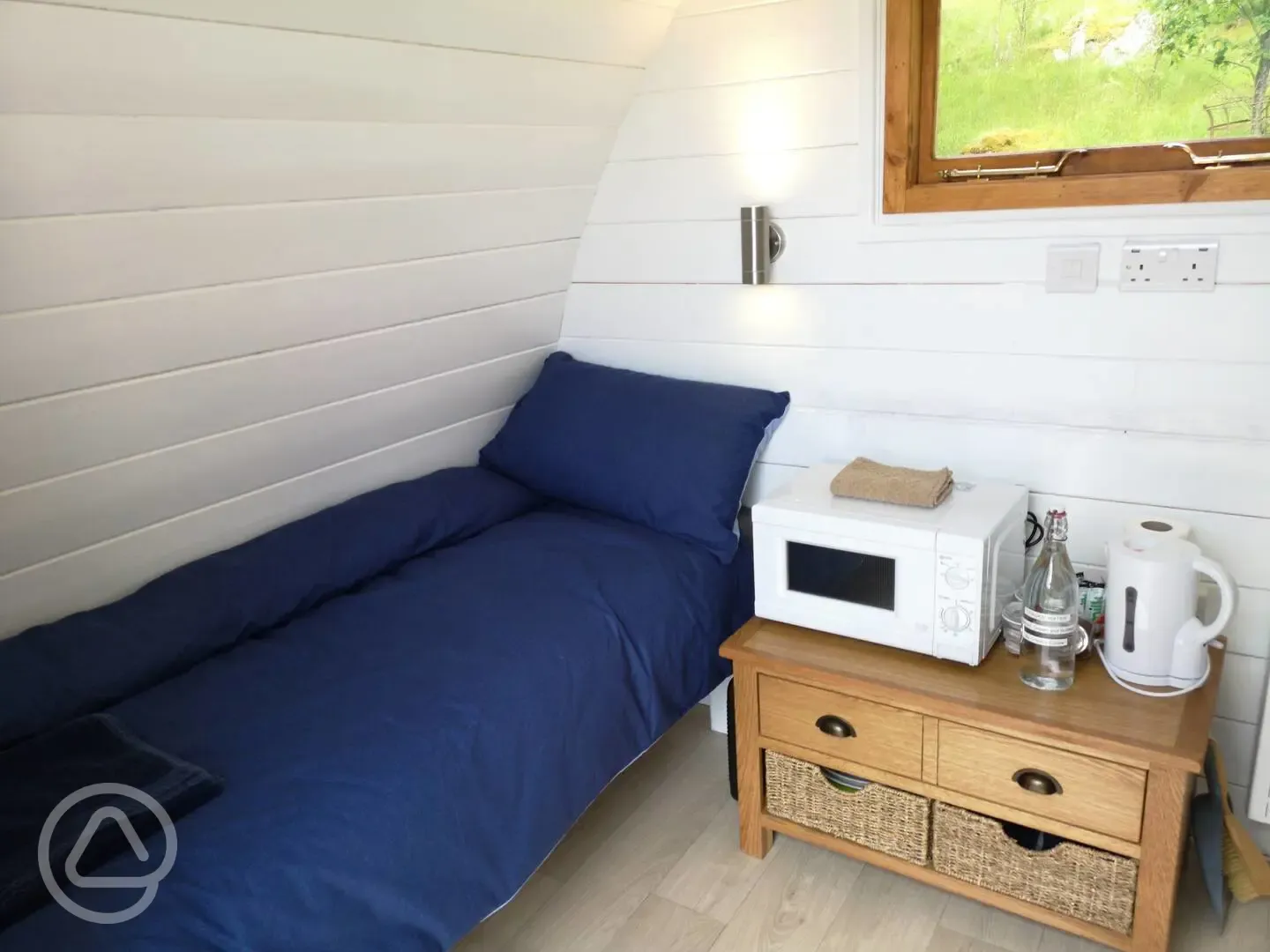 Twin bed glamping pod interior