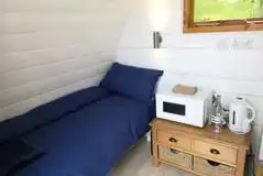 Twin bed glamping pod interior