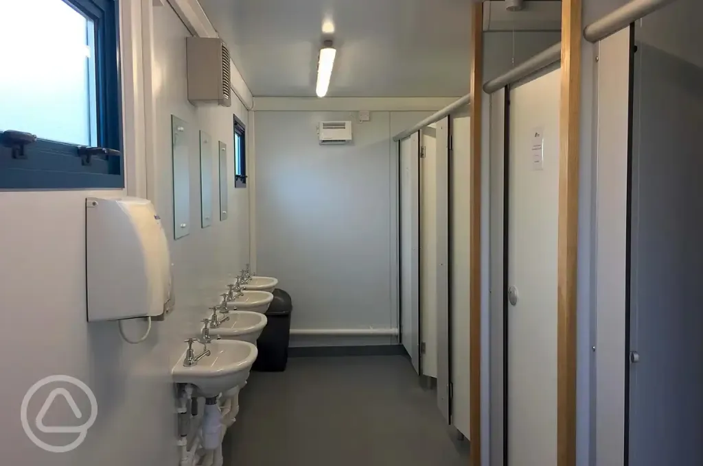 Toilet cubicles with sinks 