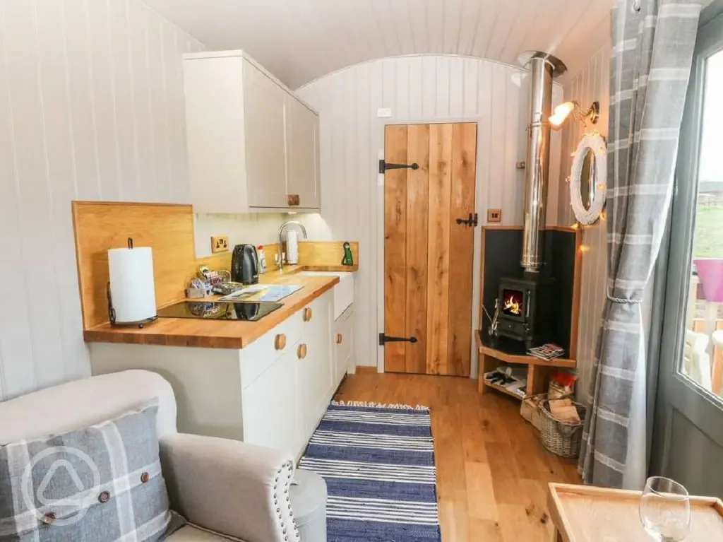 Shepherd's hut kitchen and wood burner