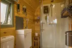 Ensuite bathroom with a hair dryer, towels, and robes provided Ensuite bathroom with a hair dryer, towels, and robes provided