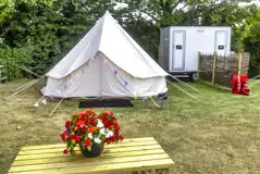 Bell tent and picnic bench
