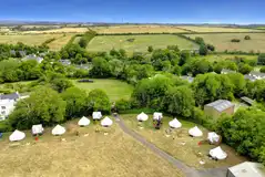 Aerial of the six furnished bell tents at Buckland Campsite