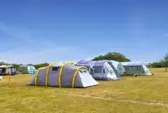 Electric grass pitches for tents, trailer tents or campervans
