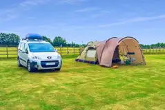 Electric grass tent pitches