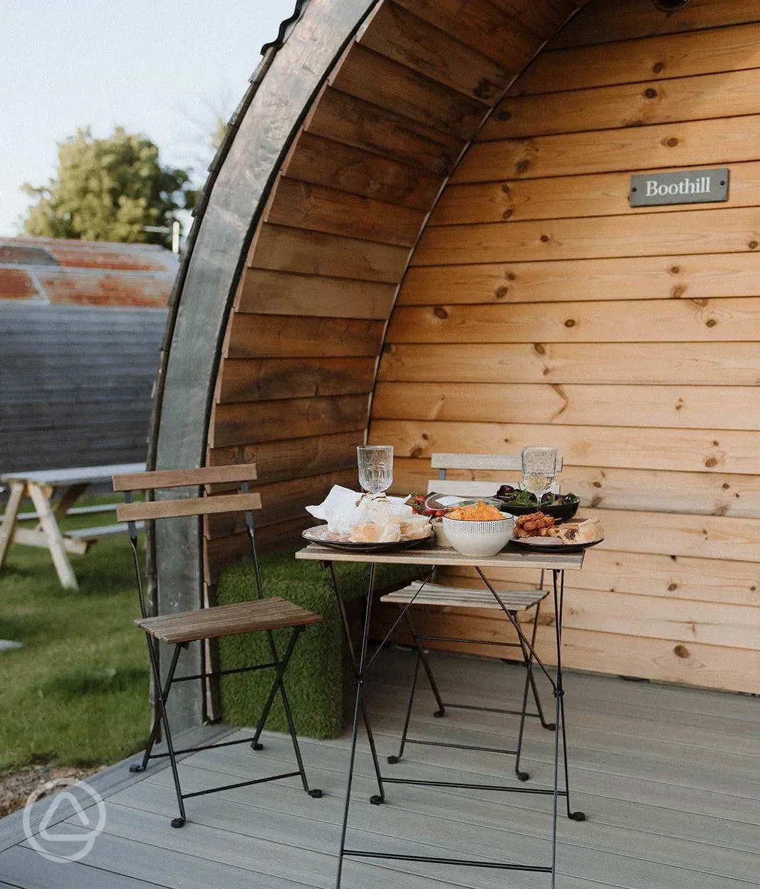 Luxury glamping pod outdoor decking area