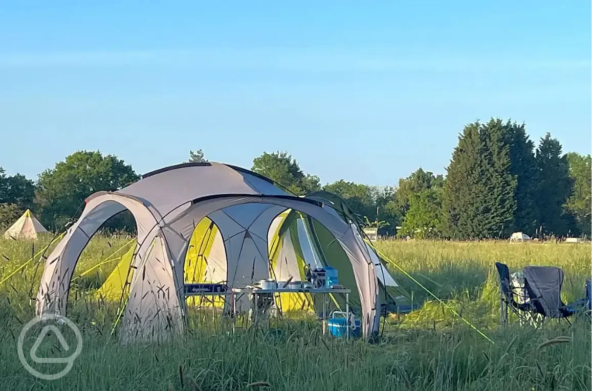 Non electric grass tent pitches