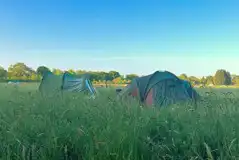 Non electric grass tent pitches