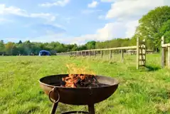 Non electric grass tent pitches and fire pit