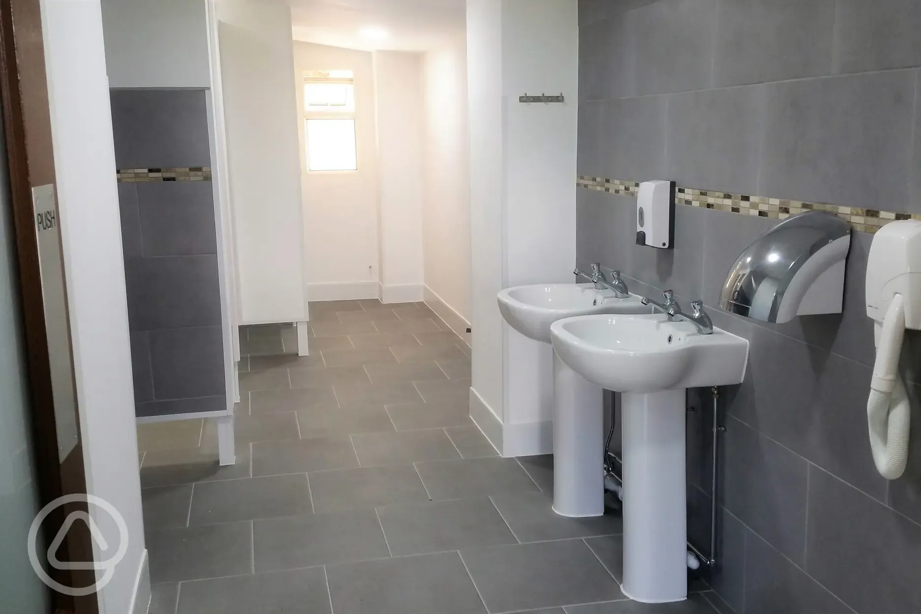 Pristine toilet and shower facilities inc disabled room