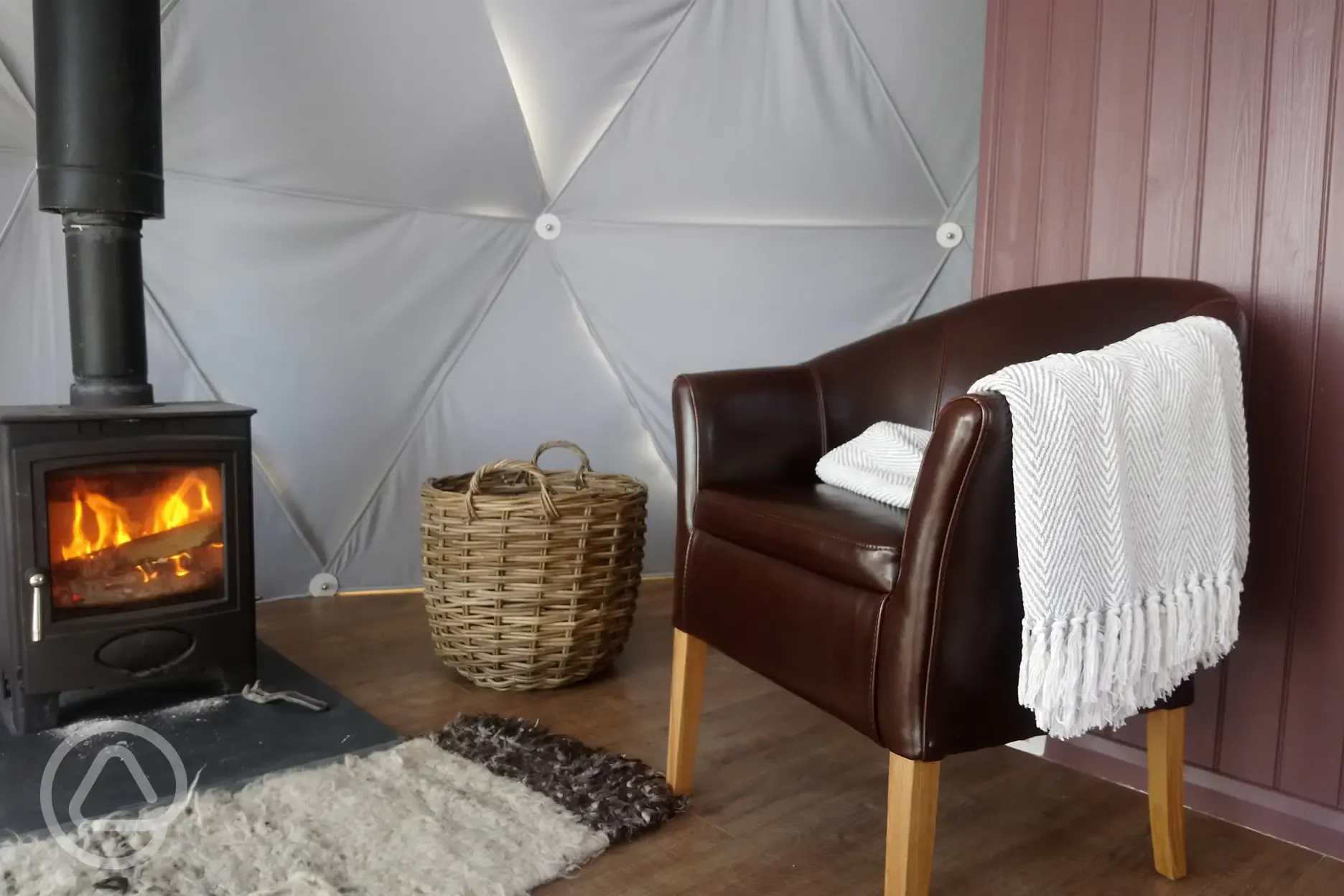The Glamping Dome has a cosy woodburner