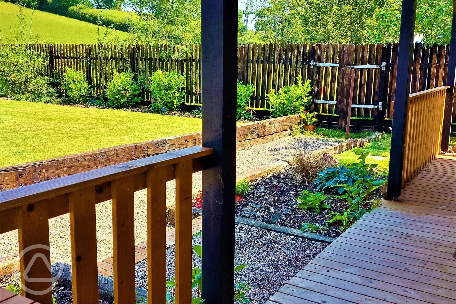 Courtyard cabin decking and garden