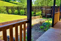 Courtyard cabin decking and garden