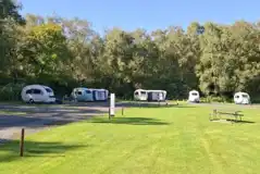 Electric hardstanding pitches in the paddock