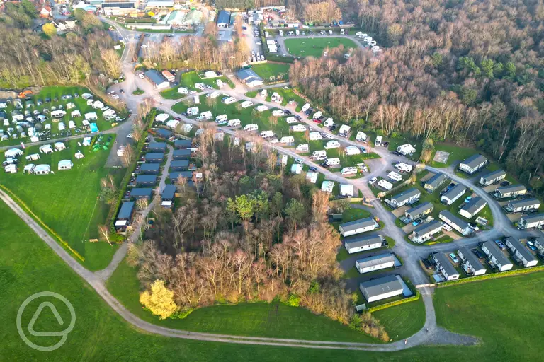 Aerial of Blakemere Holiday Park in Cheshire, surrounded by woodlands